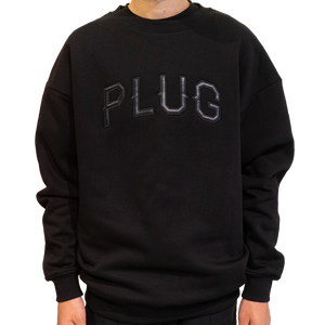 
                  
                    The Plug Leather Sweater
                  
                